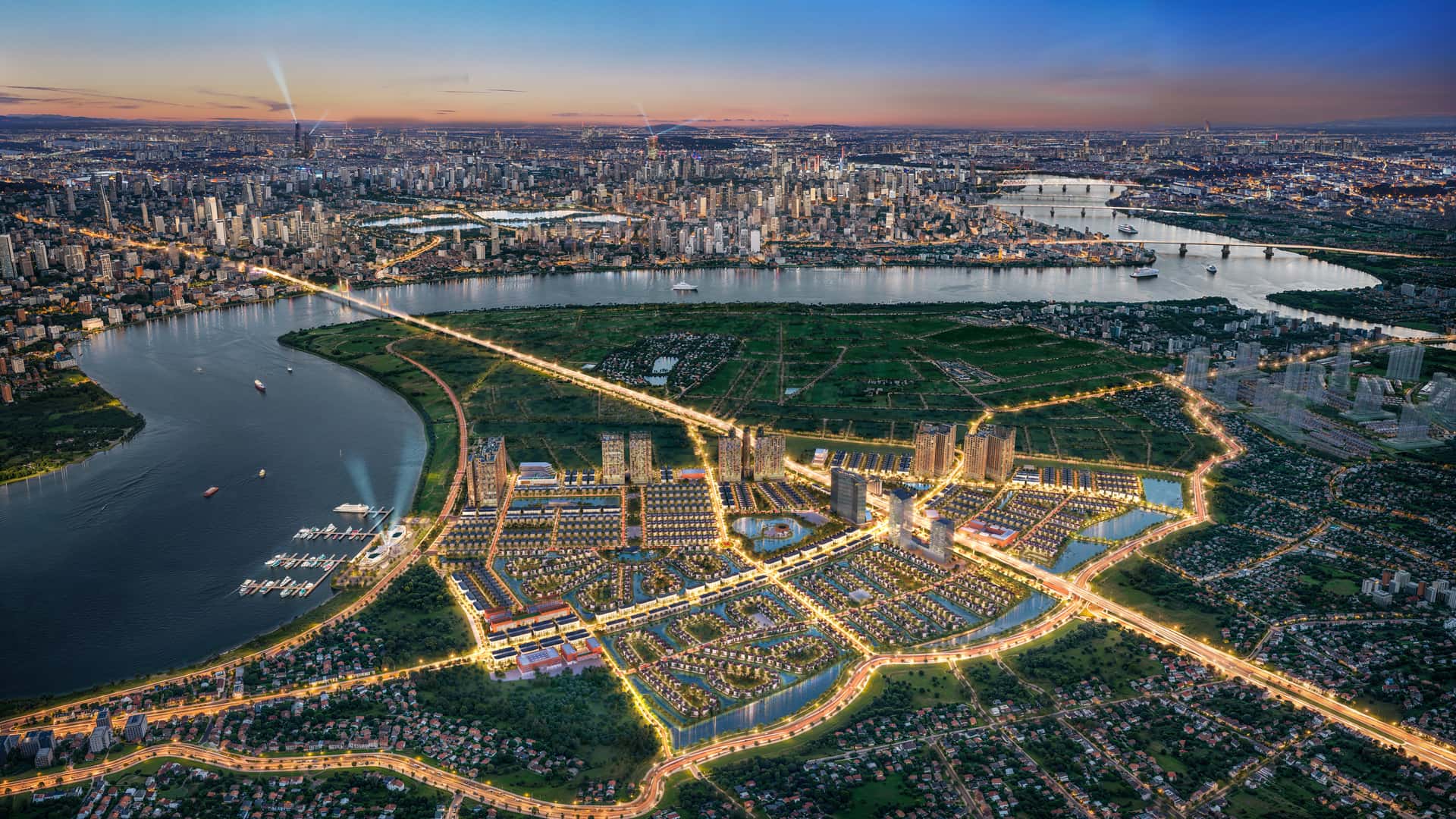 Phối cảnh Alluvia City về đêm cho thấy một khu đô thị sinh thái ven sông được quy hoạch bài bản, hệ thống giao thông – tiện ích chiếu sáng đồng bộ, kết nối hài hòa với không gian đô thị trung tâm.