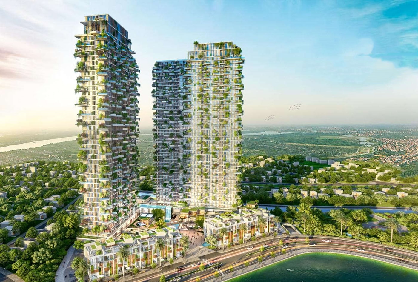 Hai tòa tháp khách sạn cao tầng nổi bật với thiết kế phủ cây xanh từ tầng trệt đến mái, nằm ven hồ và bao quanh bởi khu nhà thấp tầng cùng cảnh quan xanh rộng lớn.